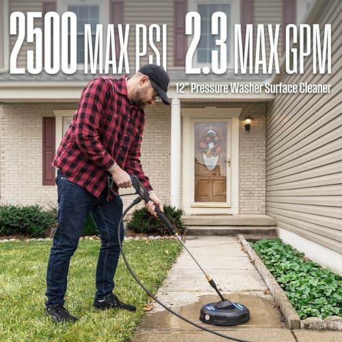 Man cleaning sidewalk with a pressure washer in front of a house.