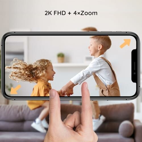 Phone displaying zoomed image of two children playing