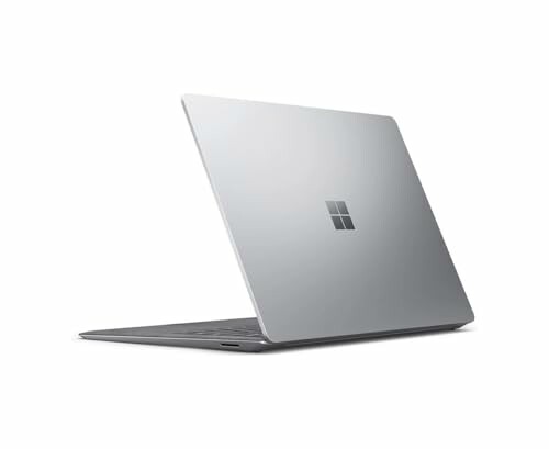 Silver laptop viewed from the side.