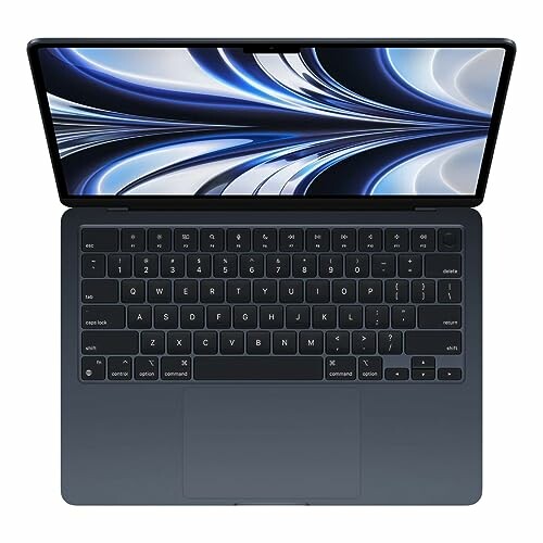 Top view of a sleek laptop with a modern design and keyboard.