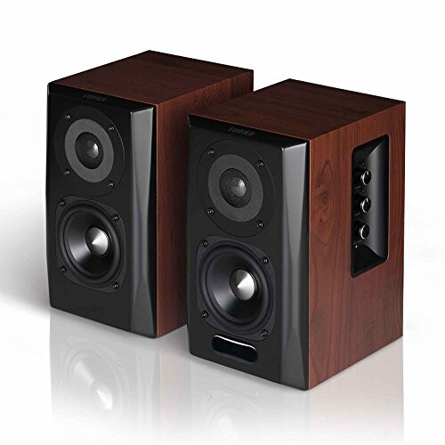 Pair of wooden bookshelf speakers with black front panel.